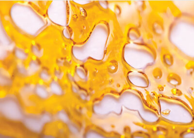 Close up of an amber botanical concentrate